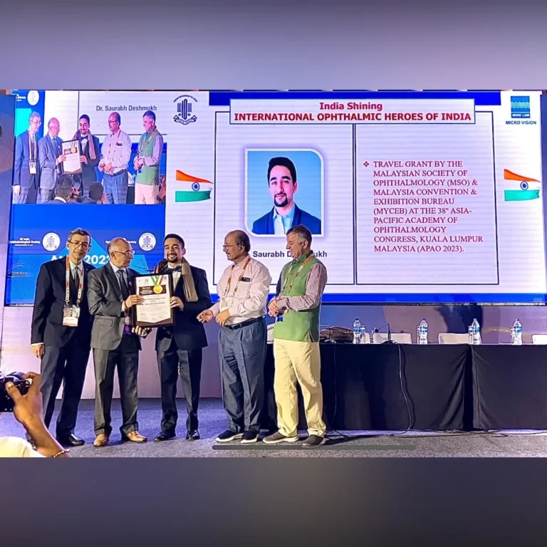 Dr. Saurabh Deshmukh receiving AIOS International Ophthalmic Hero of India Award for excellence in ophthalmology