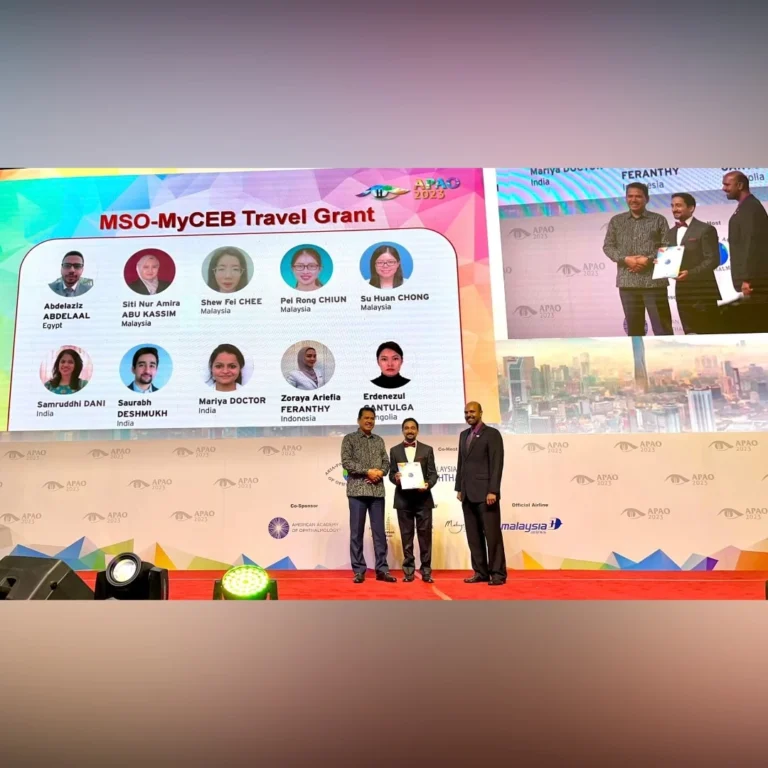 Dr. Saurabh Deshmukh receiving MSO-MyCEB Travel Grant at APAO Conference in Kuala Lumpur, Malaysia for excellence in retina surgery